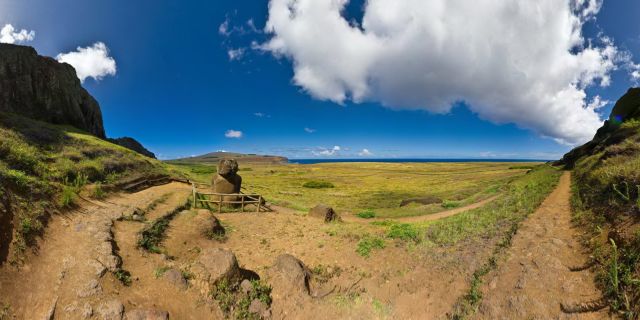At the horizon far away, you can see Ahu Tongariki Rano Raraku is a volcanic crater formed of consolidated volcanic ash, or tuff, and located on the lower slopes of Terevaka in the Rapa Nui National Park on Easter Island. It was a quarry for about 500 years until the early eighteenth century, and supplied the stone from which about 95% of the island's known monolithic sculpture (Moai) were carved. Rano Raraku is a visual record of Moai design vocabulary and technological innovation, where 397 Moai remain. Rano Raraku is in the world heritage site of Rapa Nui National Park and gives its name to one of the seven sections of the park. Wikipedia